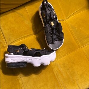 Nike Women's Black and Gold Sandals